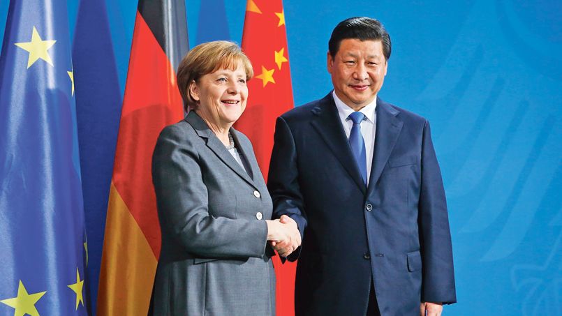 German Chancellor Angela Merkel and China's President Xi Jinping shakes hands following a joint news conference after an agreement signing, at the Chancellery in Berlin March 28, 2014.                         REUTERS/Fabrizio Bensch (GERMANY  - Tags: POLITICS)   - RTR3J0J9